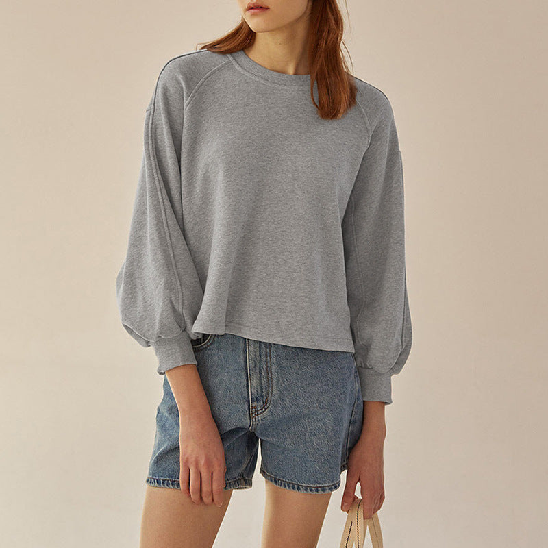 Lockeres französisches Freizeit-Sweatshirt aus reiner Baumwolle mit kurzen Laternenärmeln und Nähten