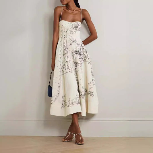Elegante sierlijke jurk met spaghettibandjes en bloemenprint