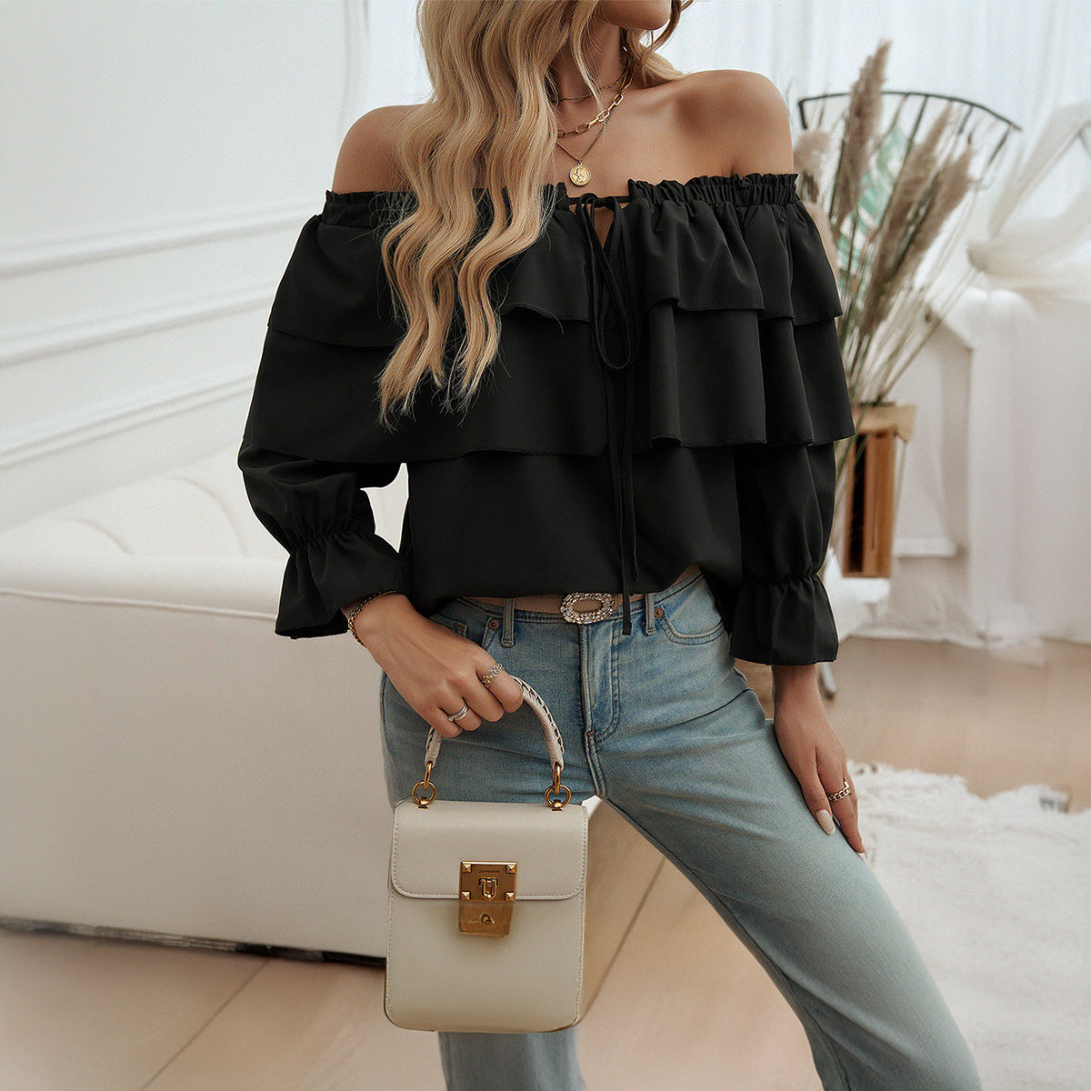 Losse plooien off shoulder bisschopsmouwen top