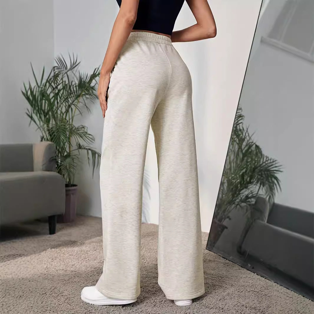 Pantalon large taille haute à effet drapé