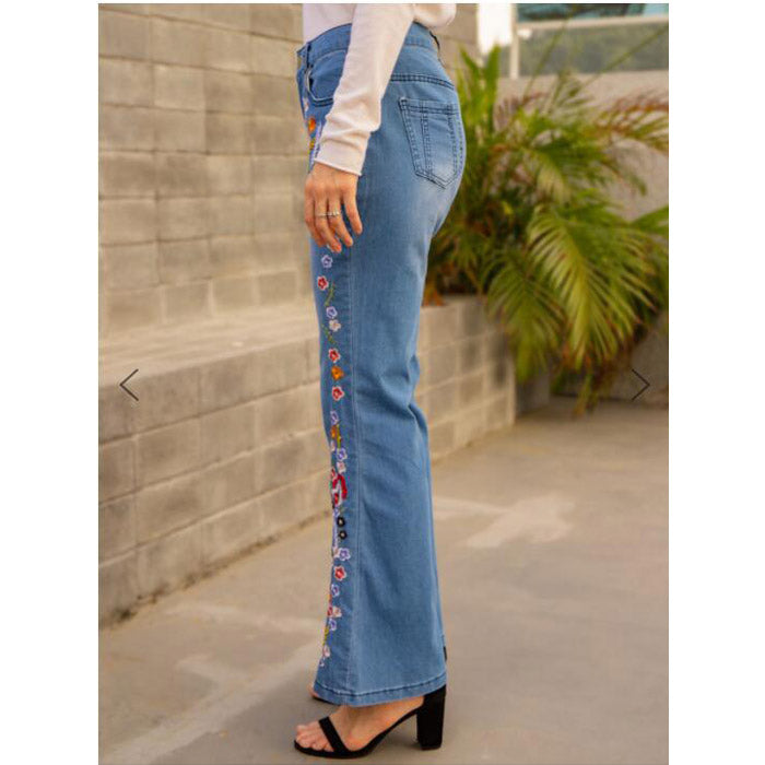 Slim-Fit-Jeans mit schmaler Passform und ausgewaschener Schlaghose mit Stickerei