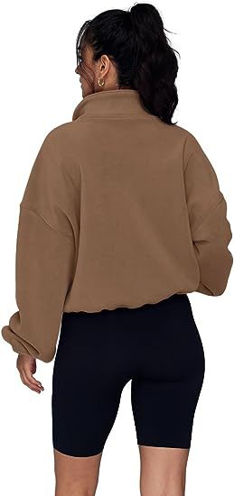 Polarfleece-Sweatshirt mit halbem Reißverschluss, Stehkragen und Kordelzug am Saum