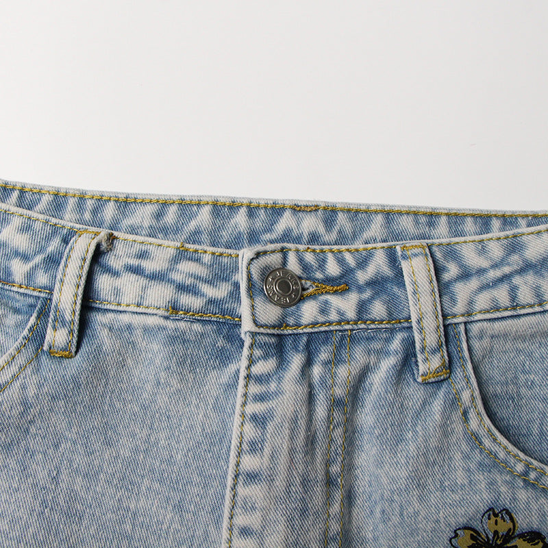 Jeans de design rasgado de cintura alta