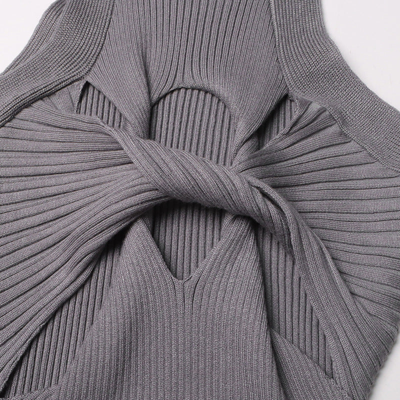 Sexy mouwloos elegant ontwerp uitgeholde uitsparing twist slim fit afslankende gebreide jurk