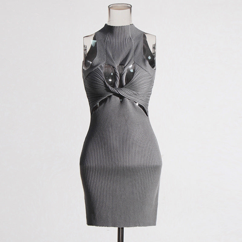 Sexy mouwloos elegant ontwerp uitgeholde uitsparing twist slim fit afslankende gebreide jurk