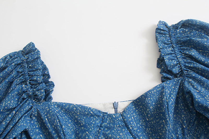 Lente elegante A-lijn jurk met V-hals, pofmouwen en blauwe print