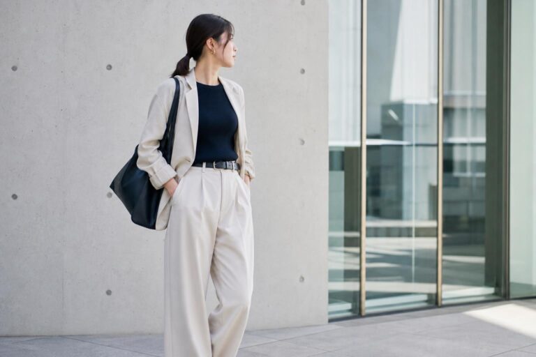 Japan capsule wardrobe essentials in neutral tones laid out neatly for calm, polished minimalist outfits