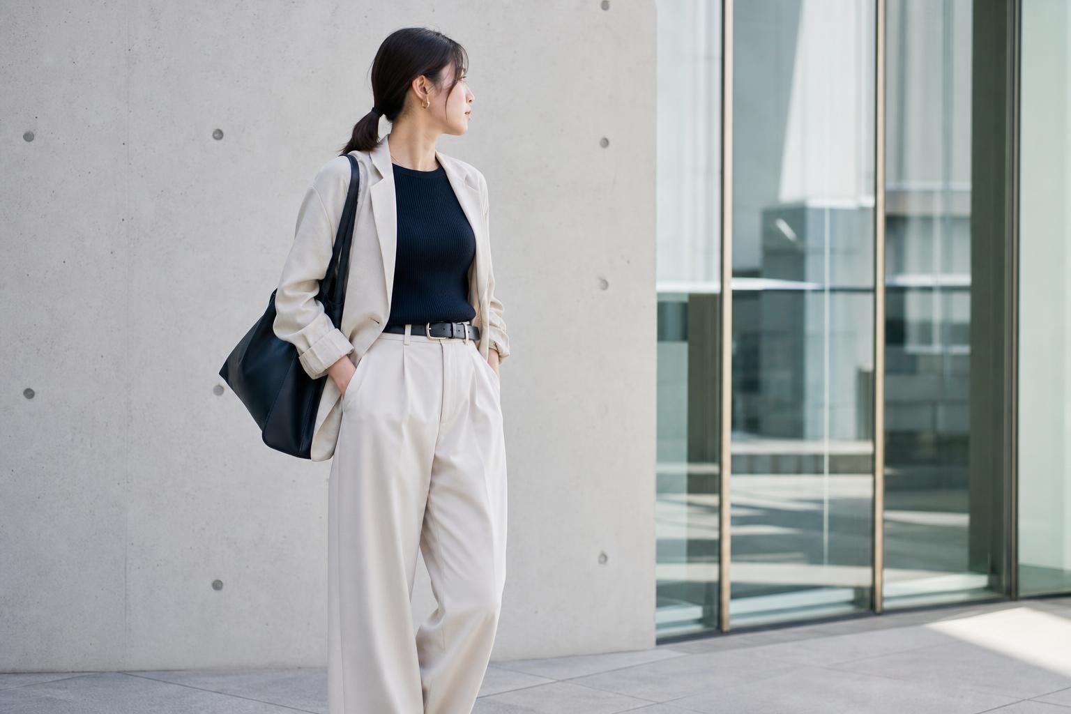 Japan capsule wardrobe essentials in neutral tones laid out neatly for calm, polished minimalist outfits