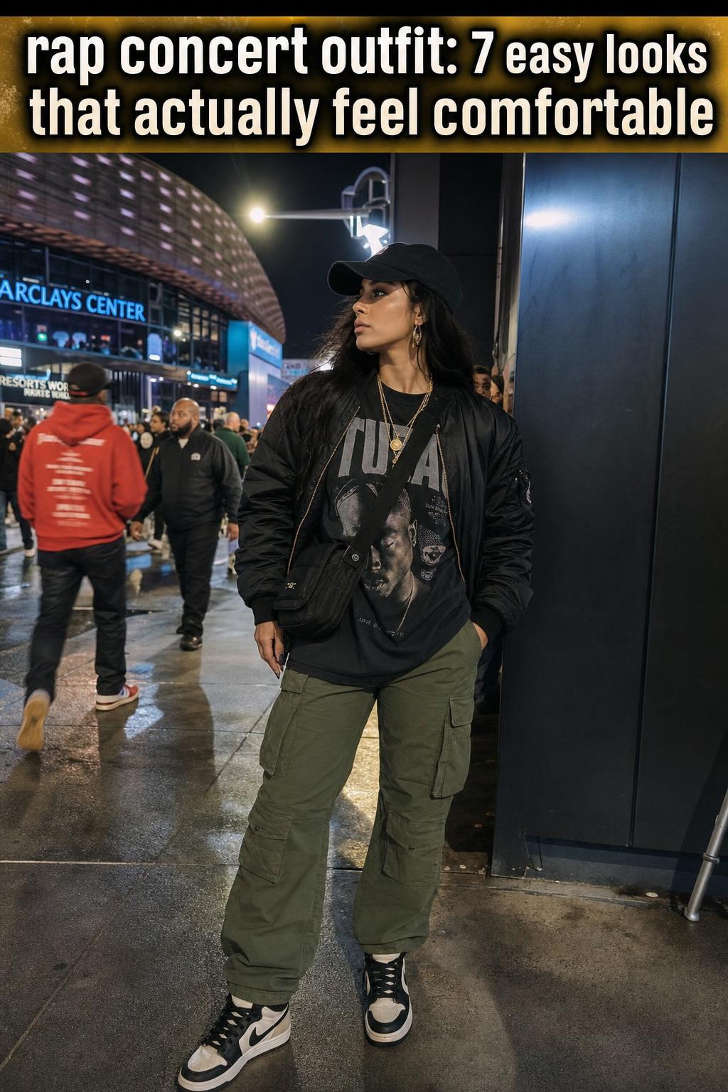 Stylish rap concert outfit with streetwear jacket, graphic tee, and sneakers under stage lights