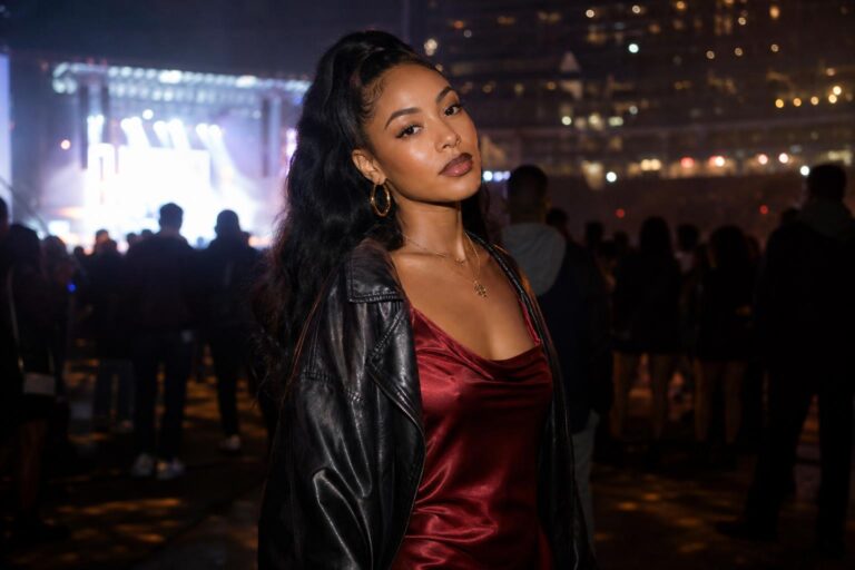 R&B concert outfit ideas with satin slip dress, leather jacket, and ankle boots in a stylish night out look