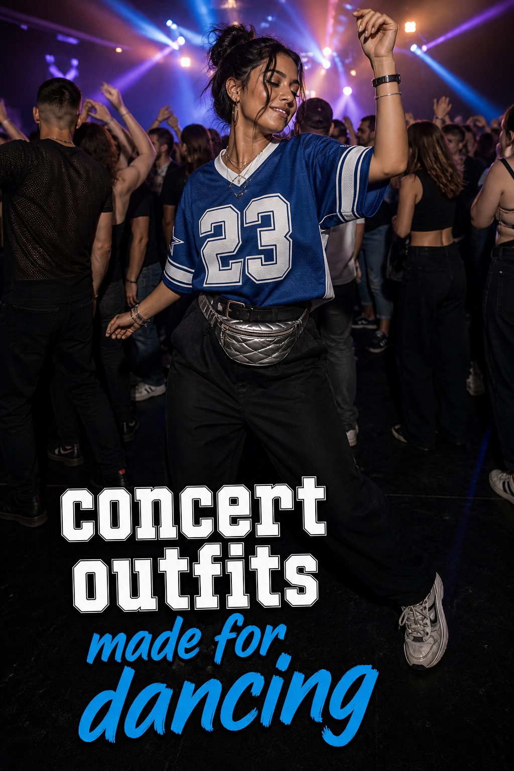 concert outfits with a blue sporty jersey, black trousers, metallic belt bag, and sneakers