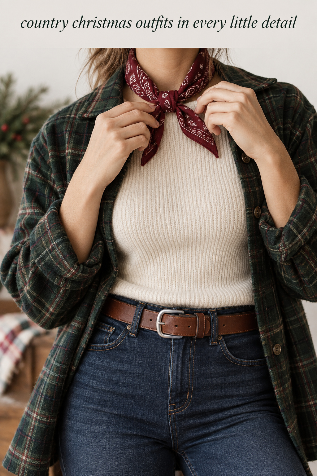 country christmas outfits close-up with a burgundy bandana, cream knit, plaid shirt, and leather belt