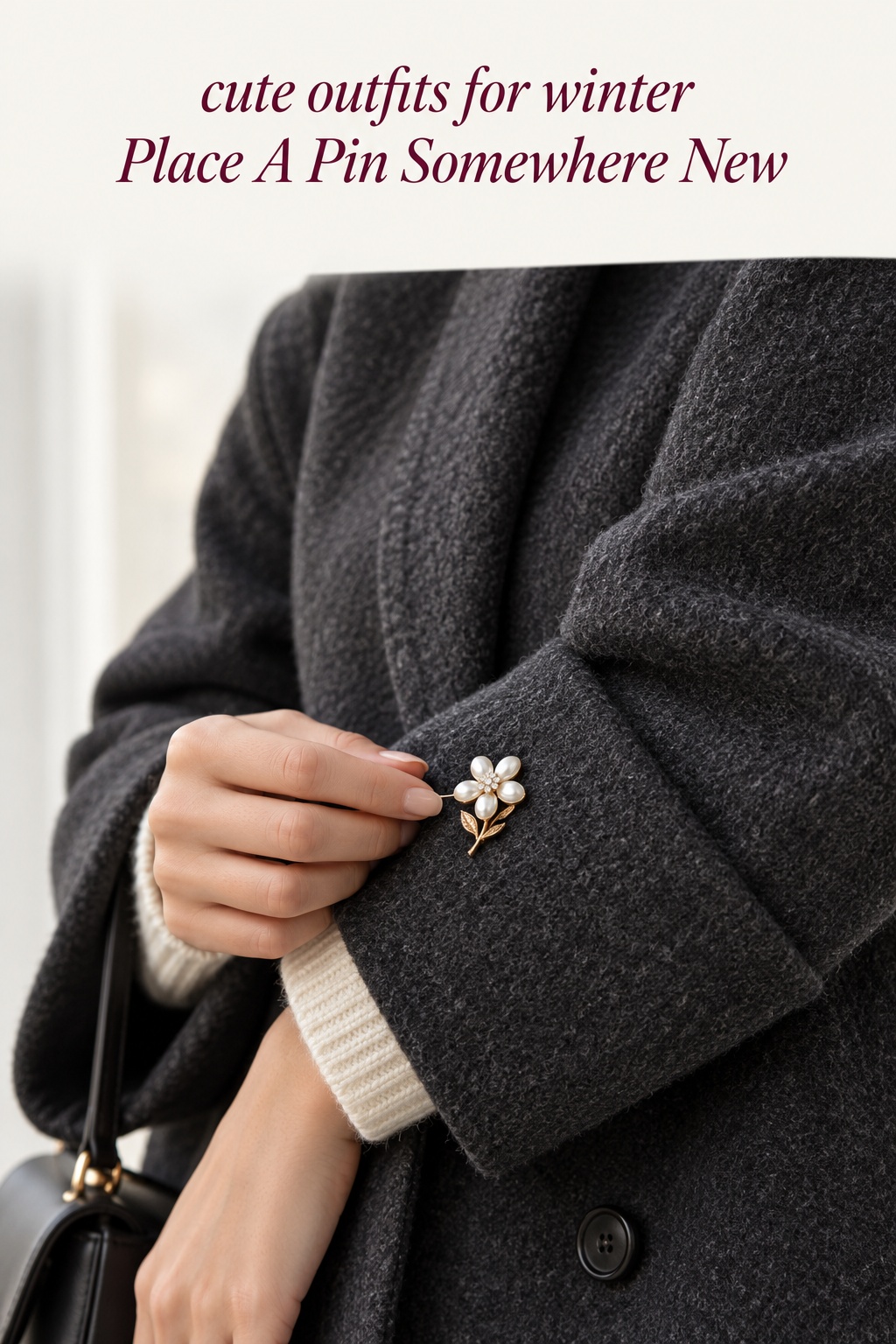 Cute outfits for winter: hands pinning a flower brooch to a wool cuff